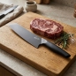 Preview: Paul Adrian Chefs Knife Beluga Ebony black DLC, style with steak