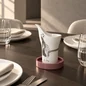 Preview: Albert L. CASIMIR Mauve round lacquer tray with Hering Berlin PIQUEUR mini jug in white biscuit porcelain