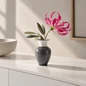 Preview: Reichenbach Porzellanvase EVA S in Grau und Weiß mit pinkfarbener Blume auf weißer Konsole