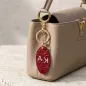 Preview: Trixi-Gronau Leder Schlüsselannhänger Urbany Crocoprägung aubergine, Prägung Kupfer. style tasche