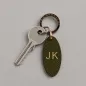 Preview: Trixi Gronau leather key fob Urbany Tejus Lizzard embossing olive, key