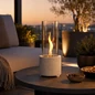 Preview: Tenderflame Glow Cycloflame Table Tischkamin am Abend auf der Terrasse, KI-Visualisierung