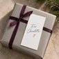 Preview: Weiße Rückseite der TRIXI GRONAU Mini-Weihnachtskarte mit Beispiel Für Charlotte