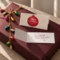 Preview: Geöffnete TRIXI GRONAU Mini-Weihnachtsklappkarte mit weißer Innenseite und beispielhaftem Weihnachtsgruß