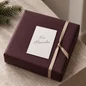 Preview: Weiße Rückseite der TRIXI GRONAU Mini-Weihnachtskarte mit handschriftlichem Beschriftungsbeispiel