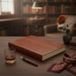 Preview: Trixi Gronau ISOLA Fotoalbum 23x30 Croco-Praegung cognac-braun auf Walnussholz-Schreibtisch mit Cognac, dunkler Rose, Messingstift und Paisley-Seidentuch in eleganter Bibliothek