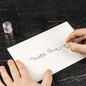 Preview: Kalligrafie mit violetter Jacques Herbin Violette Pensée Tinte und Glasfeder auf weißem Papier