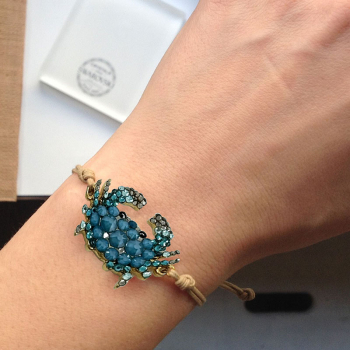 Preview: Ekaterini friendship bracelet, Baby Crab,turquoise Swarovski crystals brown cord and with gold accents, style