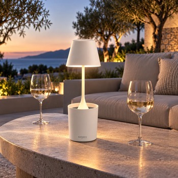 Sompex PEEKY white rechargeable table lamp on an outdoor table at sunset, background AI visualisation