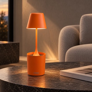 Preview: Sompex PEEKY orange rechargeable lamp with warm light on a dark side table, AI-generated living room