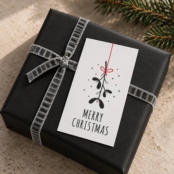 Preview: TRIXI GRONAU Mini-Weihnachtskarte Mistletoe Merry Christmas auf schwarzem Geschenk mit grauem Vivant Samtband Velvetta