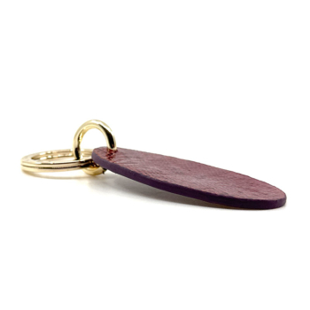 Preview: Trixi Gronau leather key fob Urbany Tejus Lizzard embossing aubergine, side