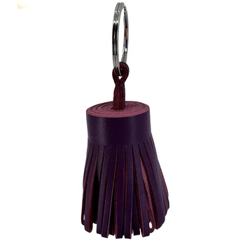 Preview: Trixi Gronau key fob leather tassel LOTTA aubergine standing with key ring