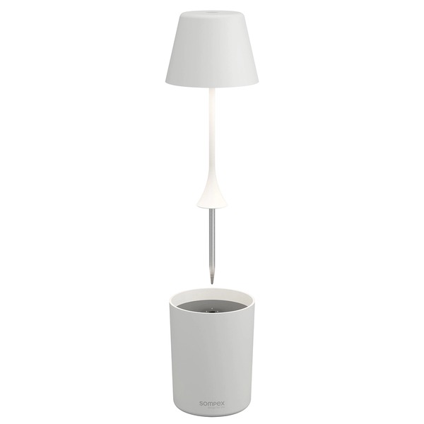 Sompex PEEKY white table lamp with removable metal soil spike above charging base