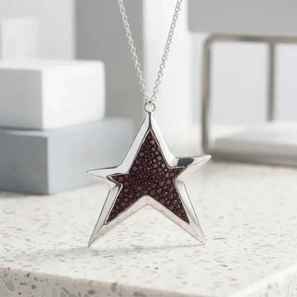 a cuckoo Moment, pendants star, sterling silver, aubergine stingray, with chain