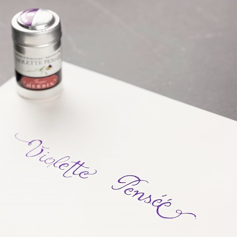 Jacques Herbin Violette Pensée Aluminiumdose mit eleganter violetter Kalligrafie auf Papier
