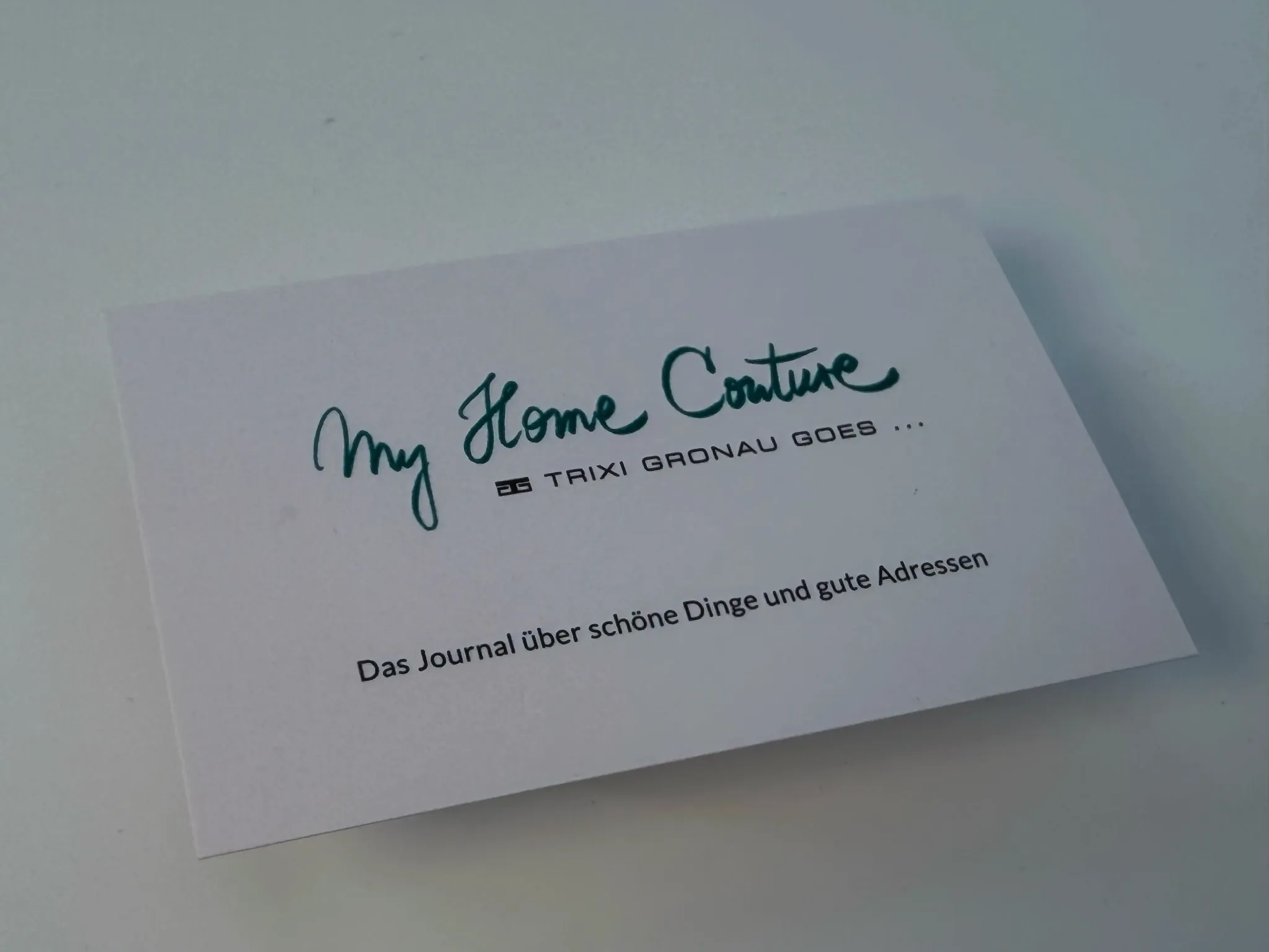 My Home Couture business card with turquoise raised printing and flat offset printing